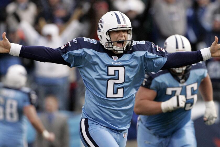 Tennessee Titans kicker Rob Bironas runs off the field after kicking a 60-yard field goal to beat the Indianapolis Colts in 2006. He was killed in a vehicle accident Sept. 20.