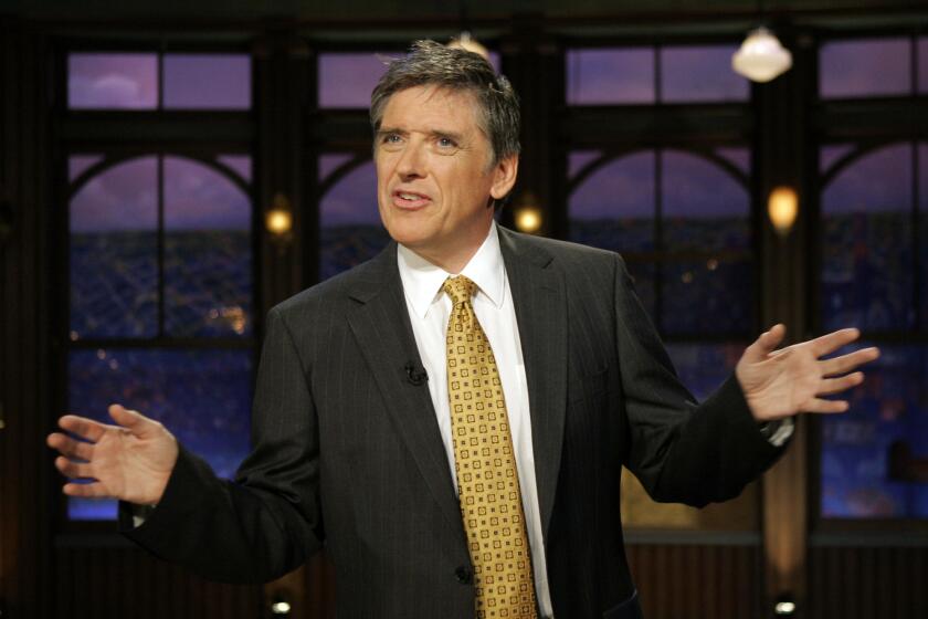 ** FILE ** Talk show host Craig Ferguson on the set of CBS' Late Late Show in this Feb. 18, 2008, file photo in Los Angeles. (AP Photo/Ric Francis) ORG XMIT: NGM_0JZ4M04A