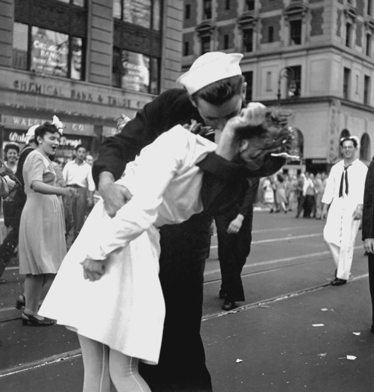 The famous kiss, captured from a slightly different angle. This one includes nurse Gloria Bullard in the background. Her recounting of the afternoon helped Don Olson and his colleagues determine that the kiss occurred at 5:51 p.m. on Aug. 14, 1945.