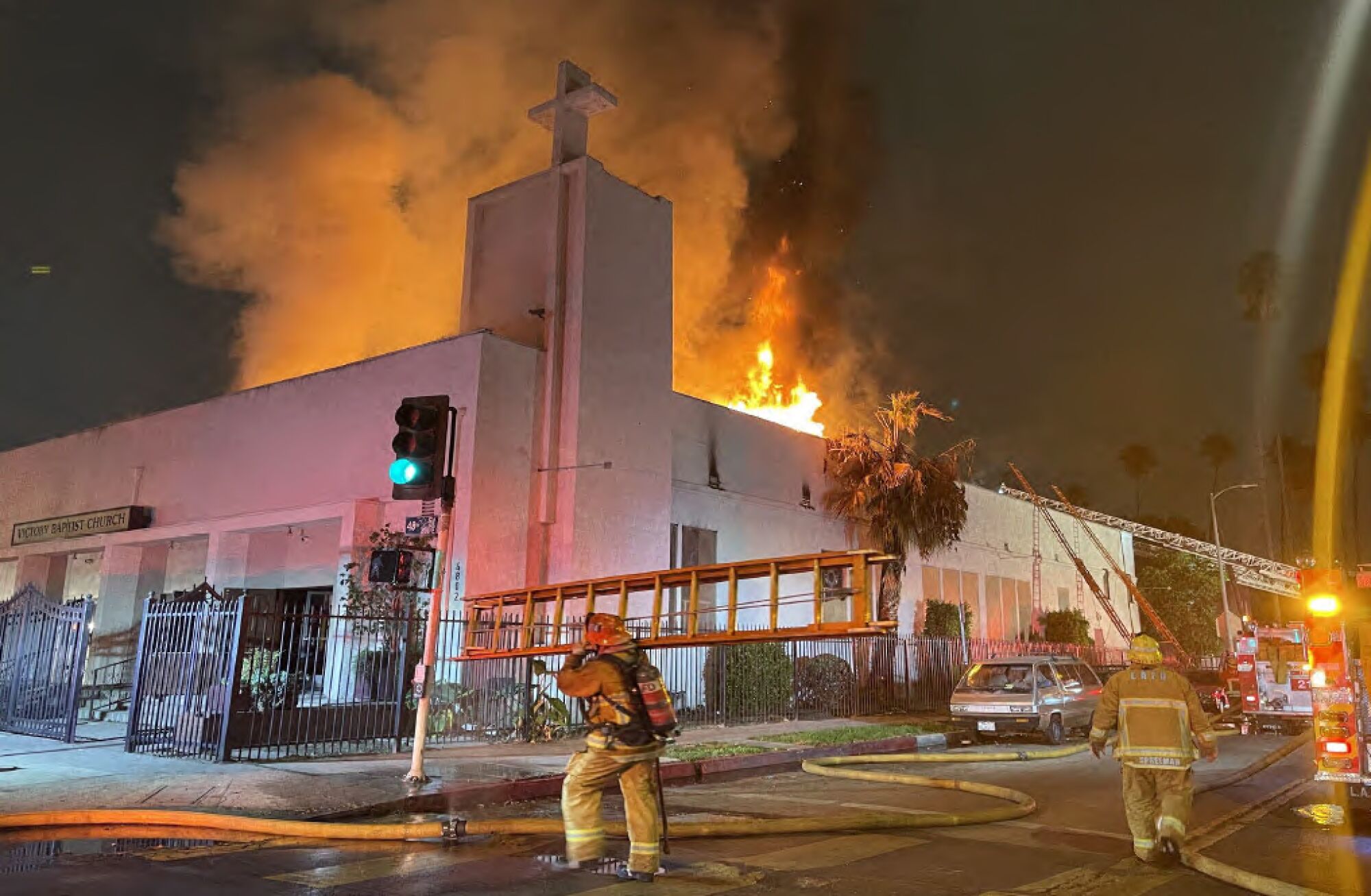 L.A. firefighters battle the blaze at Victory Baptist Church in South L.A.