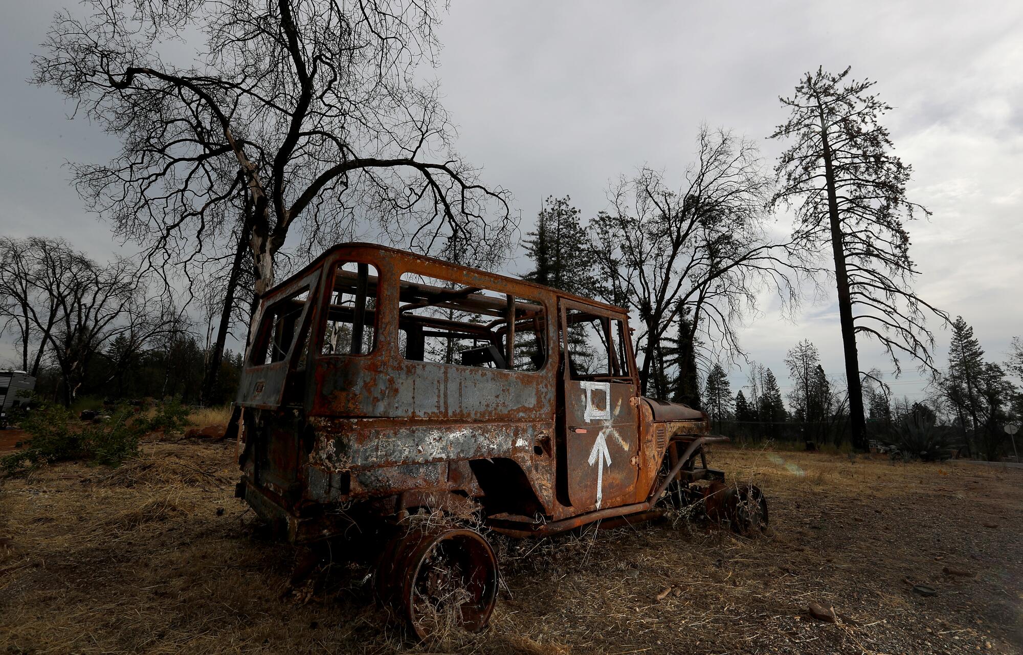 A burned-out vehicle in Paradise