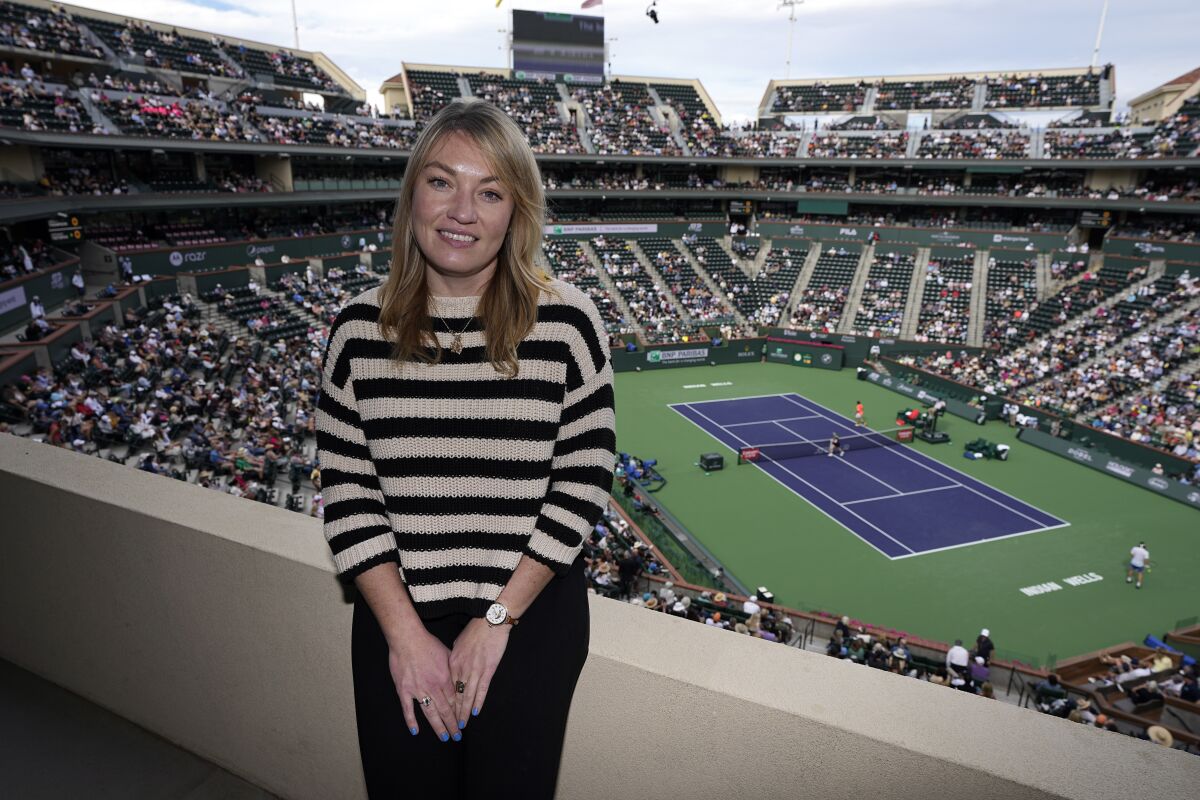 Lindsay Brandon, the WTA's new director of safeguarding, poses for a portrait at the BNP Paribas Open tennis tournament Friday, March 10, 2023, in Indian Wells, Calif. The women’s professional tennis tour is increasing efforts to protect players from predatory coaches and others. (AP Photo/Mark J. Terrill)