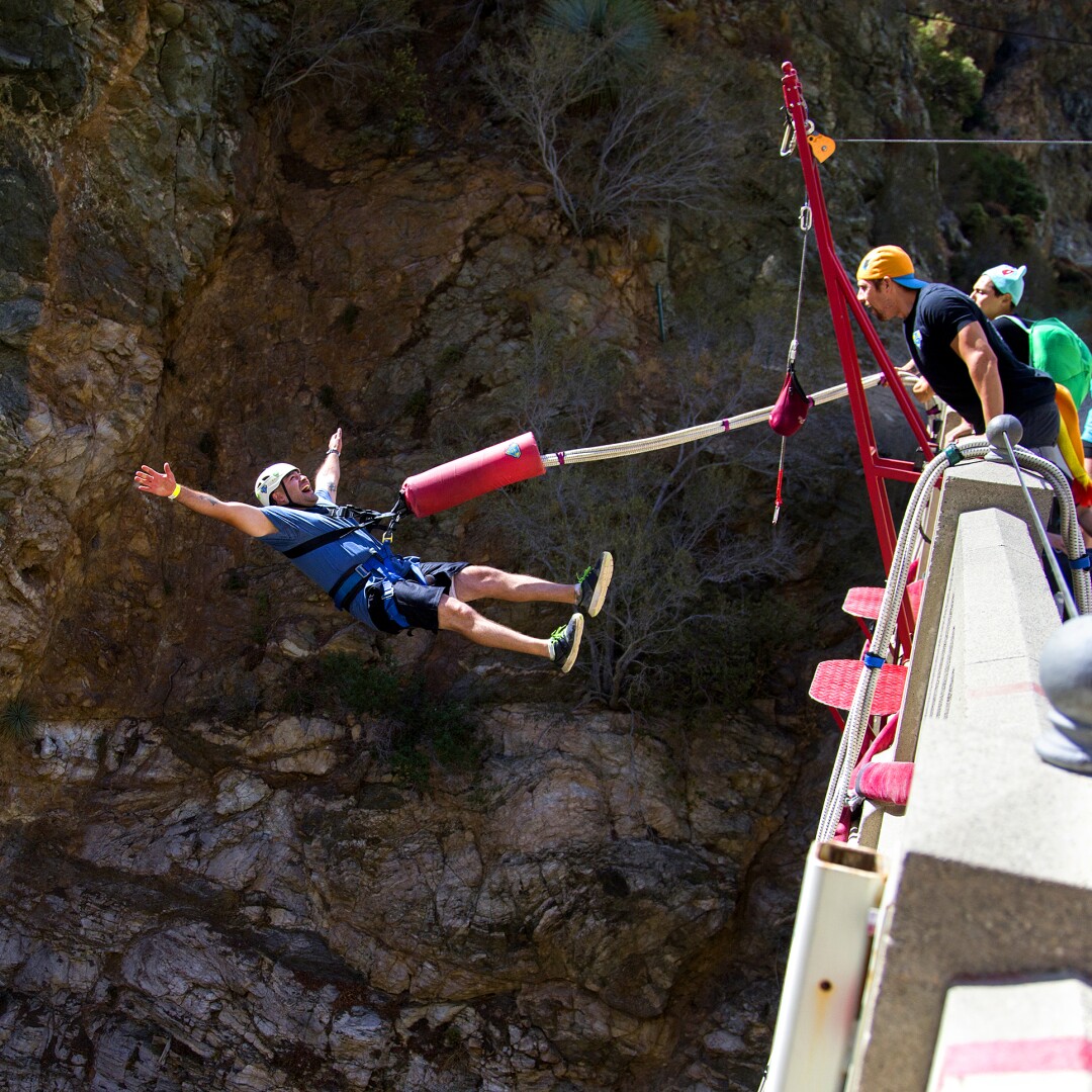  A bungee jumper does a backward plunge off the Bridge to Nowhere.