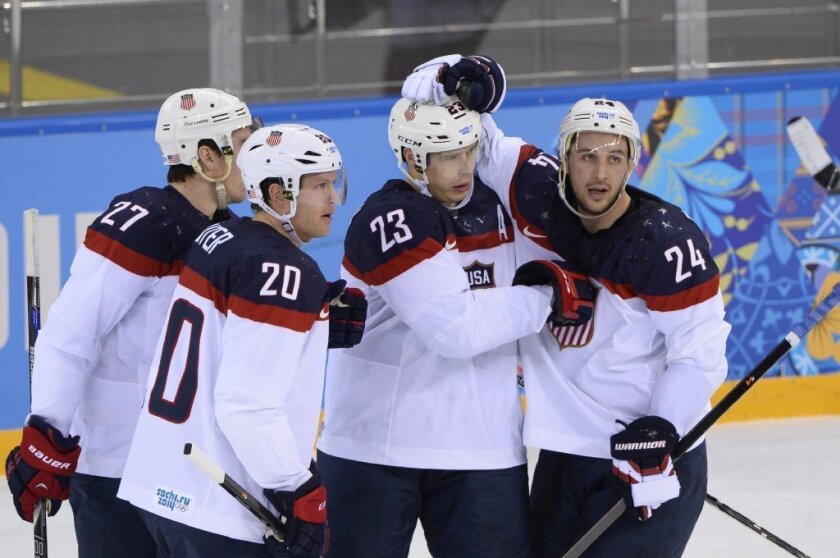 Dustin Brown, second from right, and teammates celebrate his goal during the U.S. team's 5-2 win over the Czech Republic.