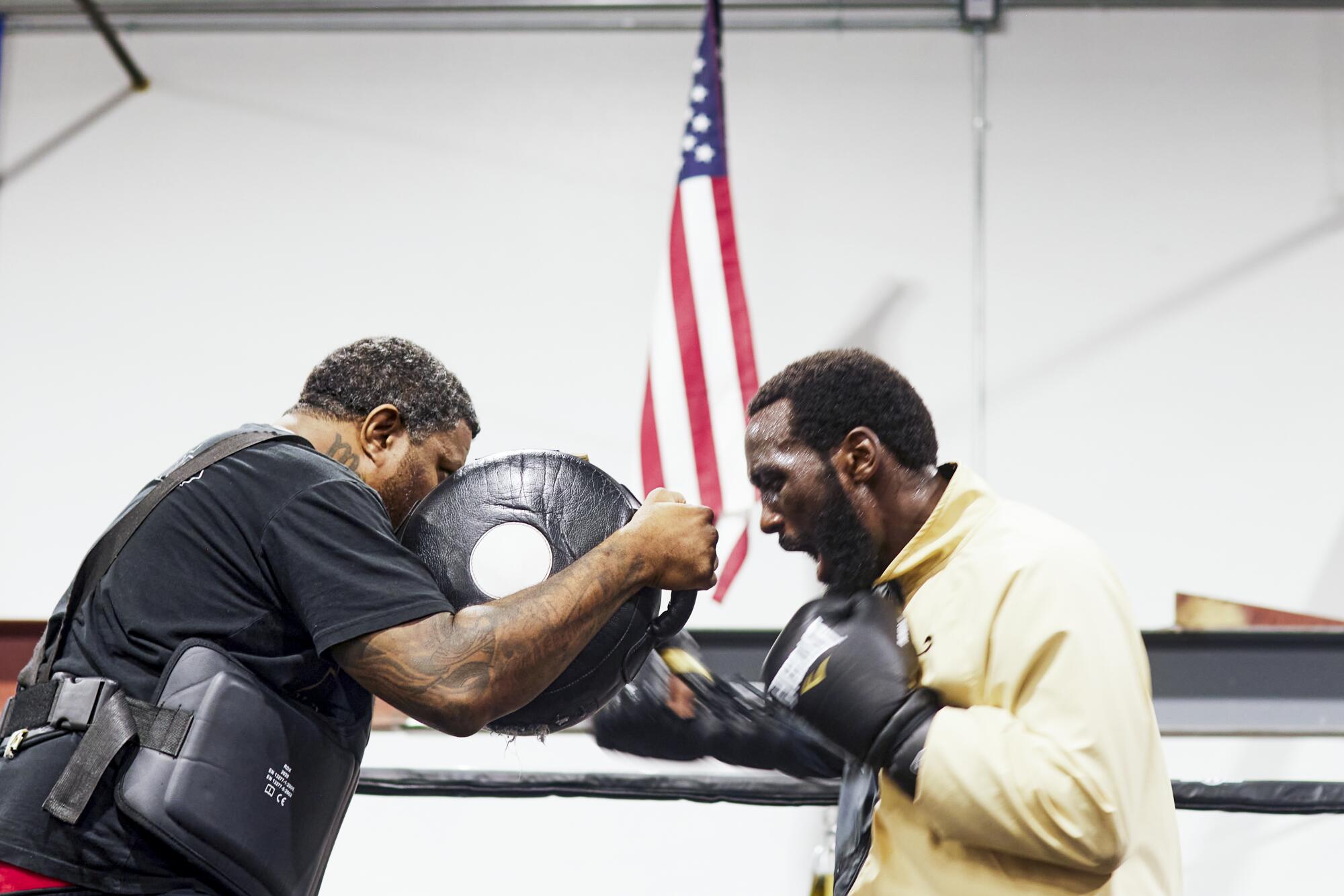 Terence "Bud" Crawford punches during a training session at the Triple Threat Boxing Gym in Colorado Springs, Colo.