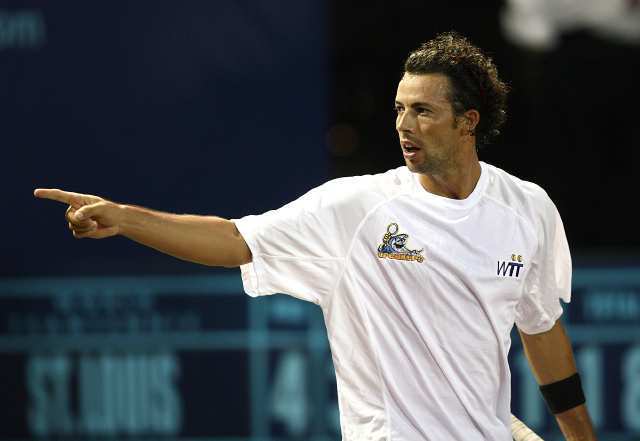 The Newport Beach Breakers' Lester Cook points toward his dad after winning a set over St. Louis Aces' Roman Borvanov during the Breakers' season-opening win.
