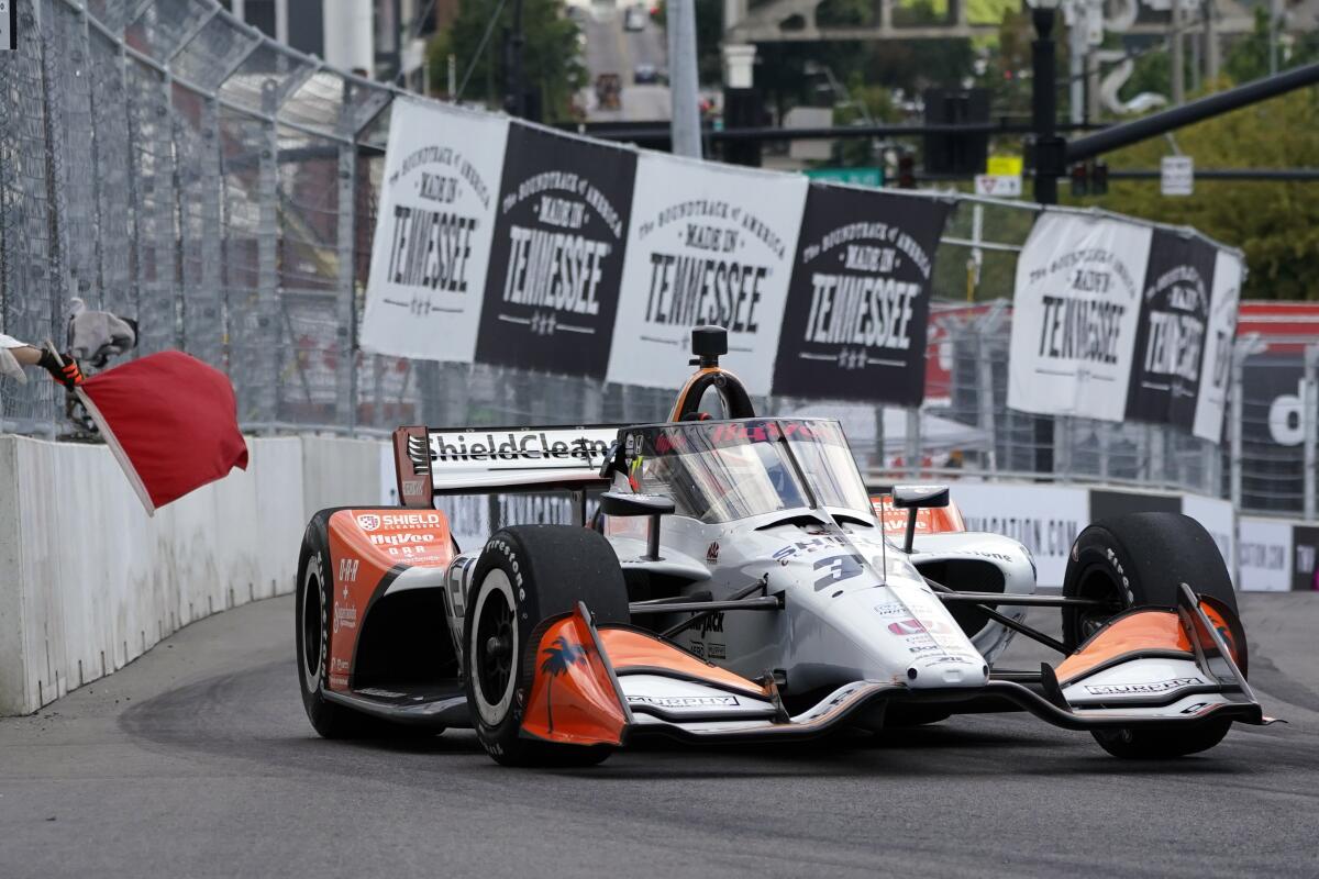 Christian Lundgaard comes through a turn during a practice session for the Music City Grand Prix auto race Saturday, Aug. 6, 2022, in Nashville, Tenn. The Music City Grand Prix is scheduled for Sunday, Aug. 7. (AP Photo/Mark Humphrey)