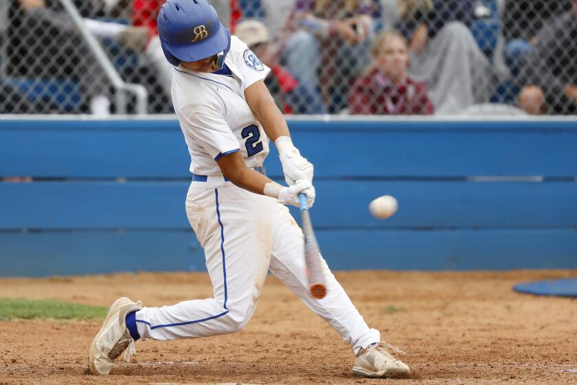 San Diego CA - May 15: Rancho Bernardo's Hugo Gonzalez hits a two-run double during a win against Eastlake on Wednesday, May 15, 2024 in San Diego, CA. (K.C. Alfred / The San Diego Union-Tribune)