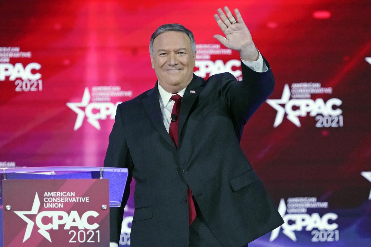 In this Feb. 27, 2021 file photo, former Secretary of State Mike Pompeo waves as he is introduced at CPAC