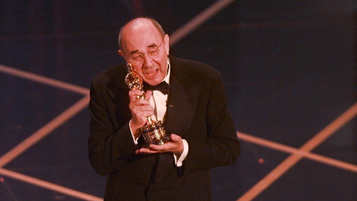 When Stanley Donen received his honorary Oscar at the 70th Academy Awards on March 23, 1998, he danced cheek to cheek with the statue.