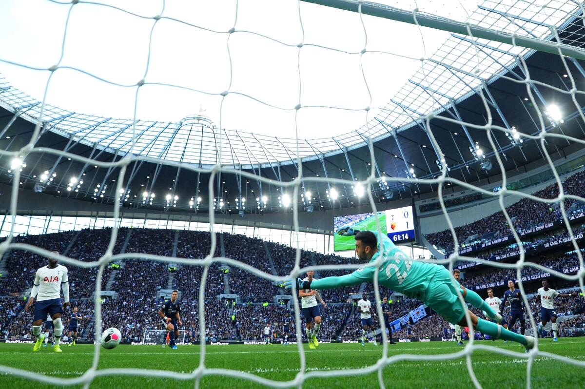 Tottenham Hotspur's Argentinian goalkeeper Paulo Gazzaniga attempts a save during the English Premier League football match between Tottenham Hotspur and Watford at Tottenham Hotspur Stadium in London, on January 1, 2019. (Photo by Glyn KIRK / AFP) / RESTRICTED TO EDITORIAL USE. No use with unauthorized audio, video, data, fixture lists, club/league logos or 'live' services. Online in-match use limited to 120 images. An additional 40 images may be used in extra time. No video emulation. Social media in-match use limited to 120 images. An additional 40 images may be used in extra time. No use in betting publications, games or single club/league/player publications. / (Photo by GLYN KIRK/AFP via Getty Images) ** OUTS - ELSENT, FPG, CM - OUTS * NM, PH, VA if sourced by CT, LA or MoD **