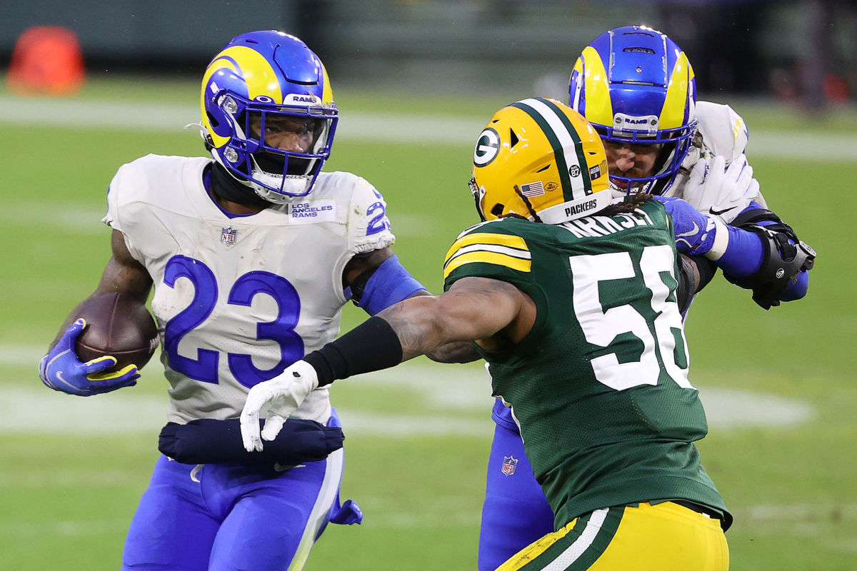 Rams running back Cam Akers carries the ball against the Packers.