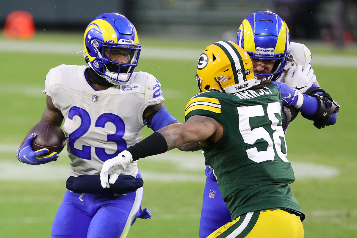 Rams running back Cam Akers carries the ball.