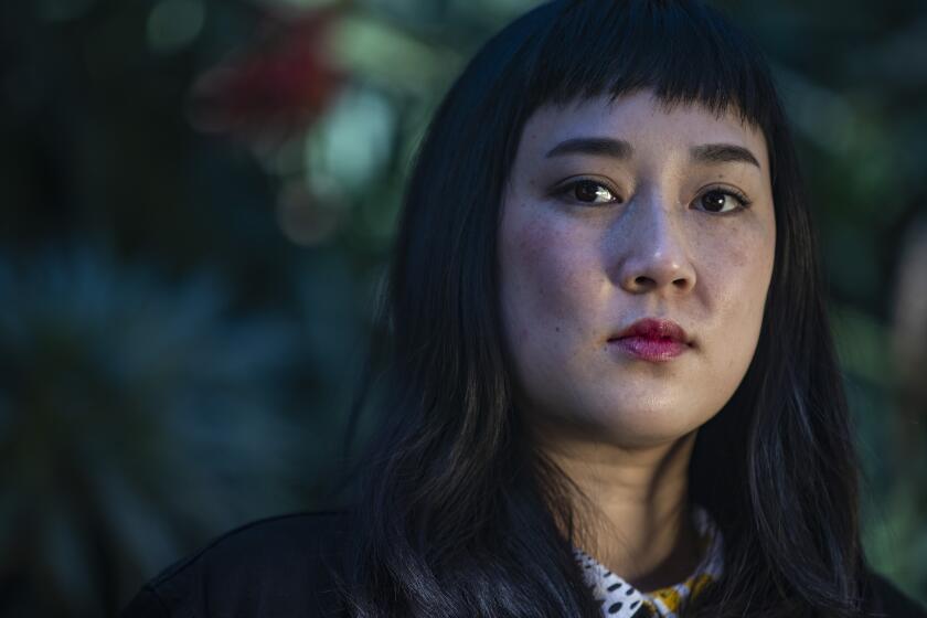 GLENDALE, CA - JANUARY 26: Filmmaker Kate Tsang sits for portraits at Catalina Verdugo Adobe Park on Tuesday, Jan. 26, 2021 in Glendale, CA. Tsang wrote and directed the film "Marvelous and The Black Hole" that will be premiering at Sundance. (Brian van der Brug / Los Angeles Times)