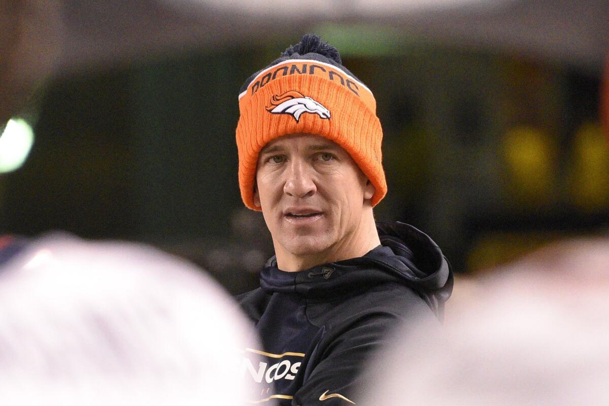 Broncos quarterback Peyton Manning (18) watches from the sideline during a loss to the Steelers on Dec. 20.