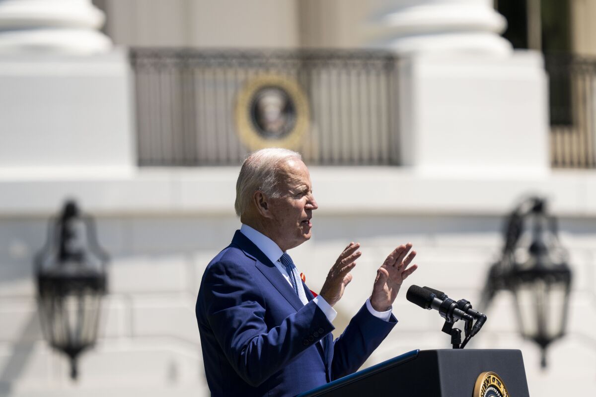 President Biden speaks during a White House event 