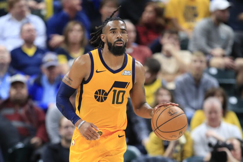 Jazz guard Mike Conley brings the ball upcourt against the Pacers during a game Nov. 27, 2019, in Indianapolis.