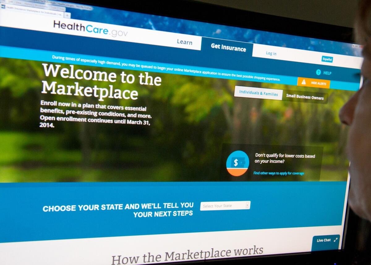 A woman in Washington, D.C., visits the HealthCare.gov insurance marketplace website.