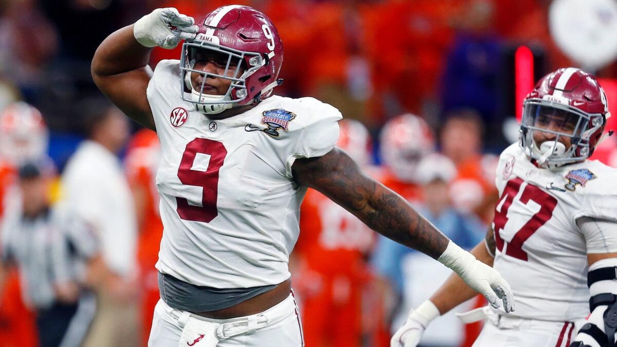 Defensive lineman Da'Shawn Hand (9) and his Crimson Tide teammates will be seeking a sixth national title for coach Nick Saban on Monday night against Georgia.