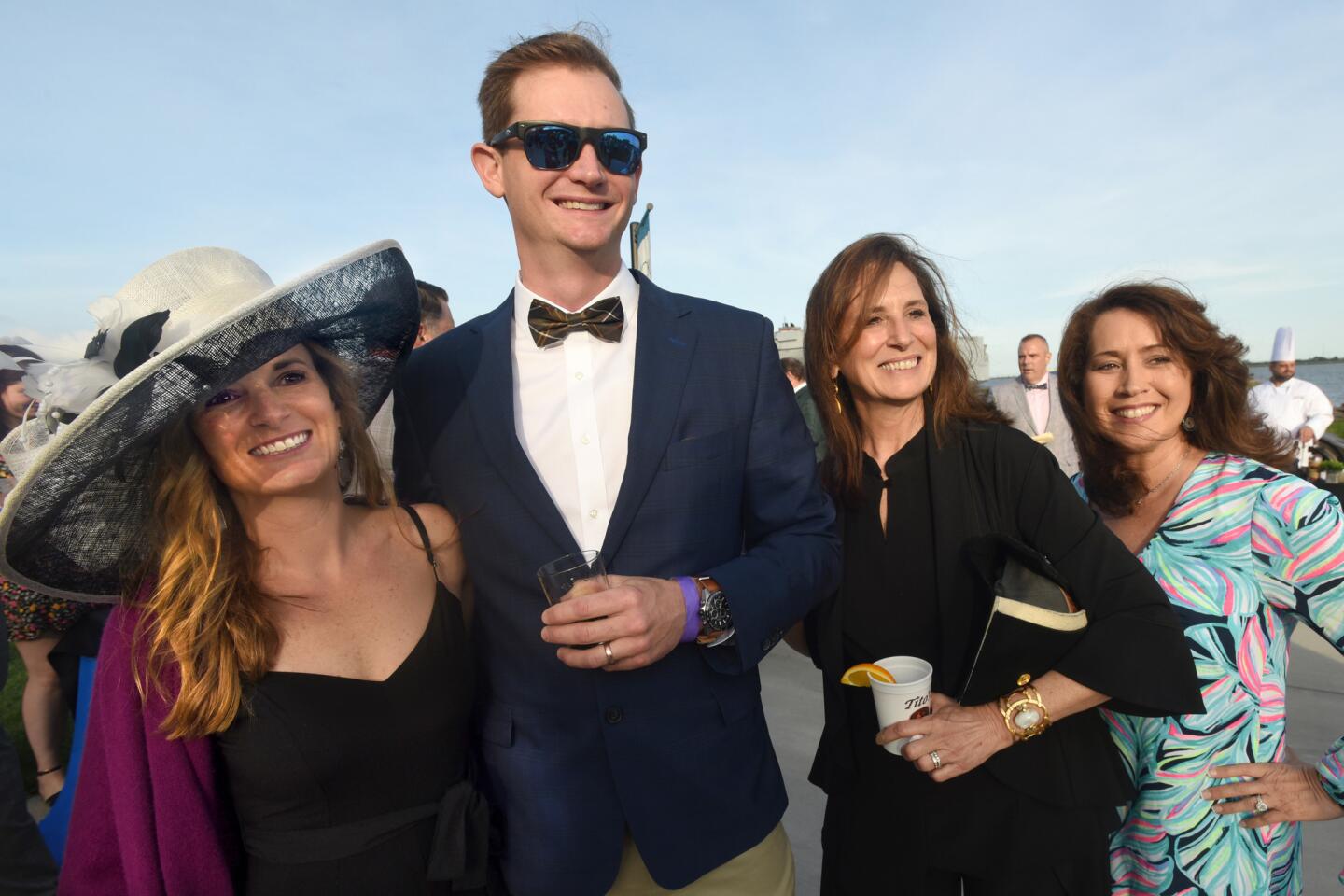 From left, Kara and Alex Gerstmyer, Patty Douglas, and Deena Dermer at the Bourbon and Bowties charity fundraiser held at Rye Street Tavern in Port Covington.