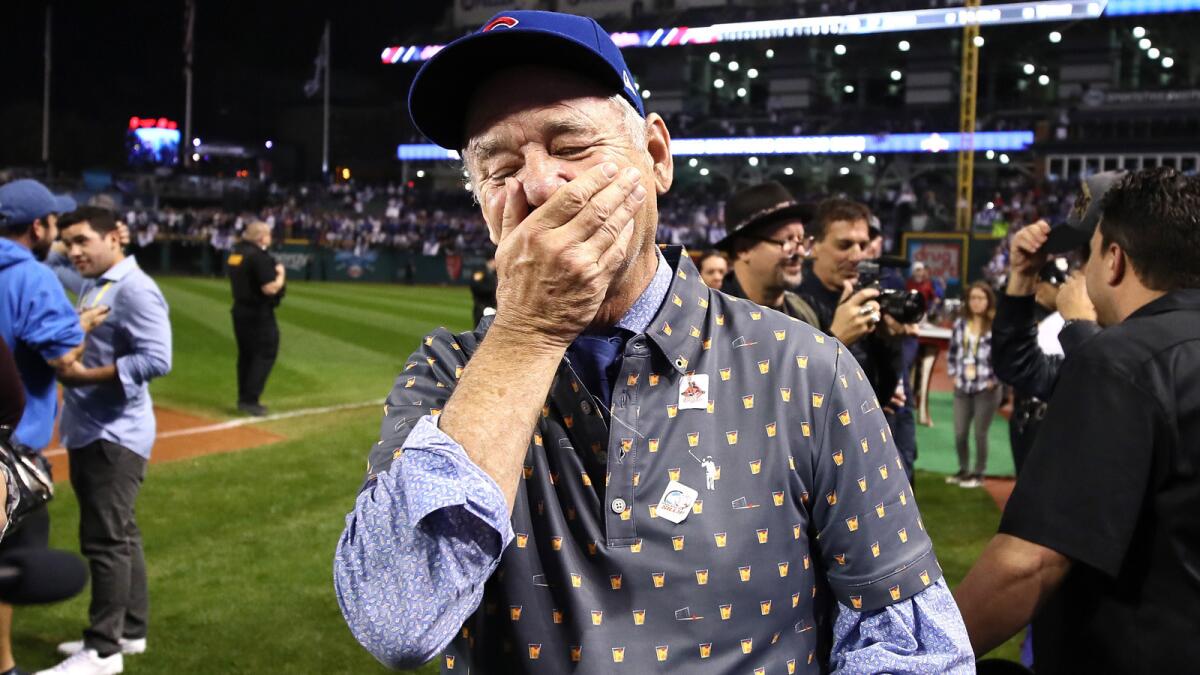 Bill Murray reacts on the field in Cleveland after the Chicago Cubs defeated the Indians 8-7 in Game 7 of the 2016 World Series.