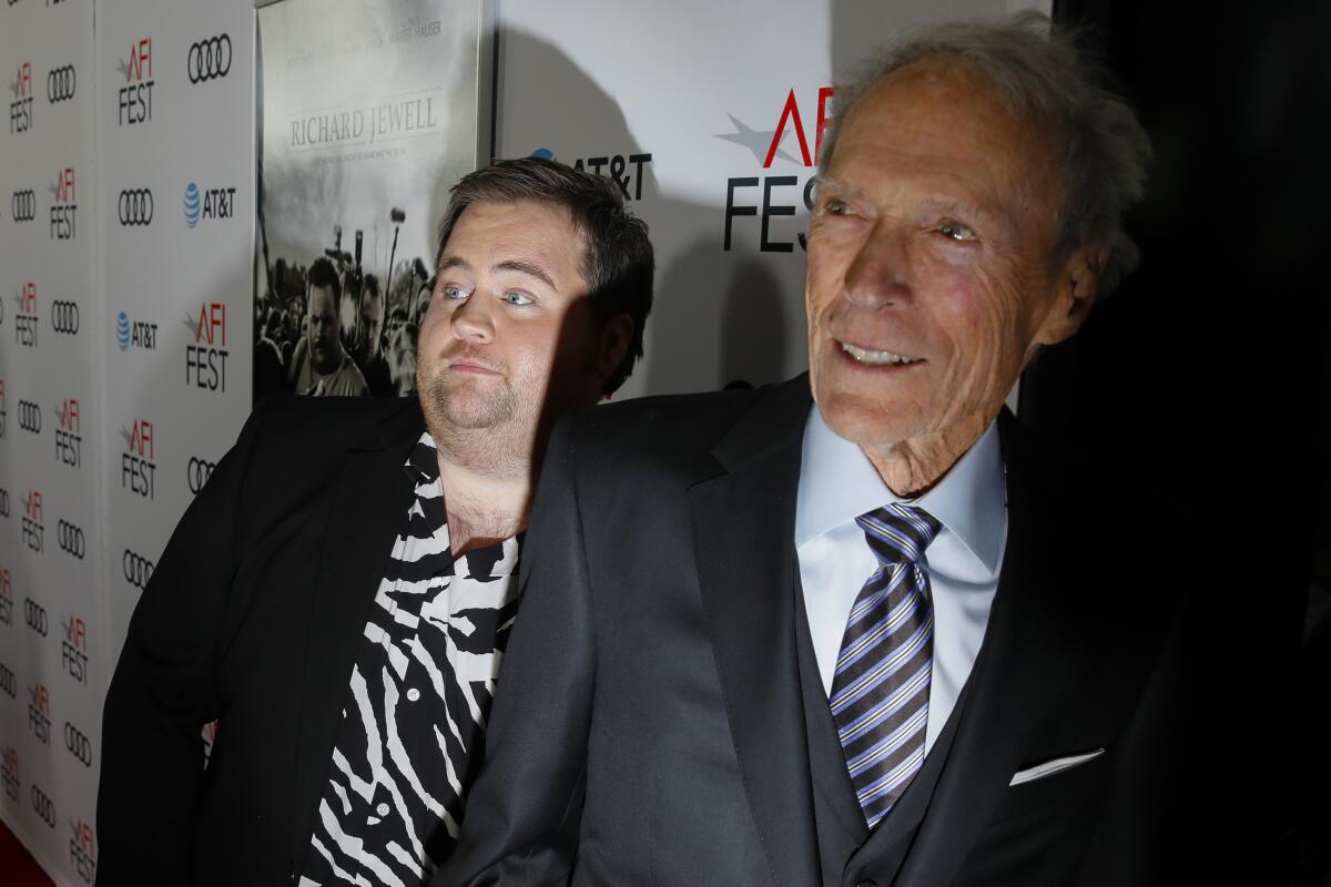 Paul Walter Hauser and Clint Eastwood arrive for the AFI Fest premiere of "Richard Jewell."