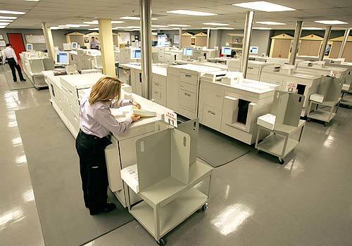 A bank of photo copiers at Golden Era Productions runs 24-7, printing Scientology materials with the words of Hubbard for adherents around the globe.