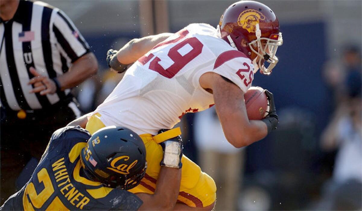 USC running back Ty Isaac scores on a four-yard run against California during the Trojans' 62-28 win over the Golden Bears on Saturday.