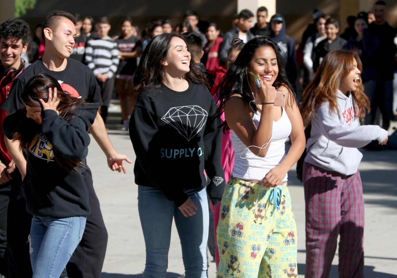 As part of Spirit Week, a group of students, including senior Ashley Vela, front right, danced during lunch wearing their pajamas for Pajama Day at Glendale High School in Glendale on Thursday, November 5, 2015.
