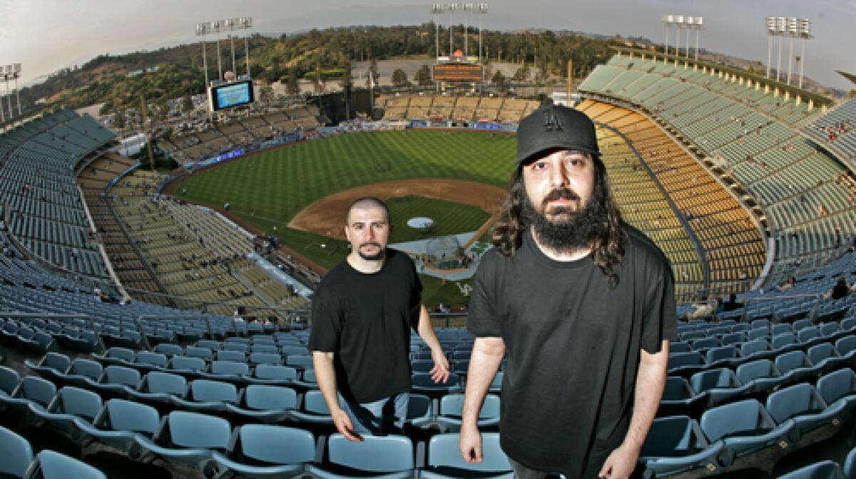 FIELD OF ENDEAVOR: System of a Downs John Dolmayan, left, and Daron Malakian lead Scars on Broadway, whose debut album arrives Tuesday.