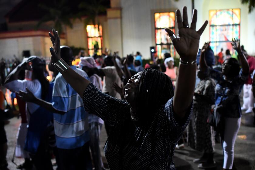 MIAMI, FLORIDA OCTOBER 24, 2019-Haitians celebrate Jericho during the Annual Spiritual Revival at Notre Dame D'Haiti Catholic Church in the Little Haiti area of Miami, Florida. (Wally Skalij/Los Angerles Times)
