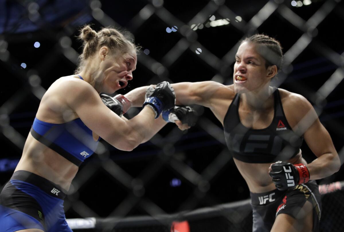 UFCs All-Time Top 10: #8, Ronda Rousey ushers in women's era at UFC 157   and nearly loses sports bra 