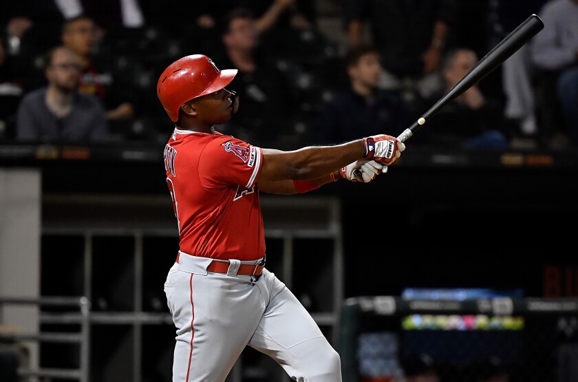 Angels' Justin Upton hits a home run in the ninth inning against the Chicago White Sox on Sept. 6.