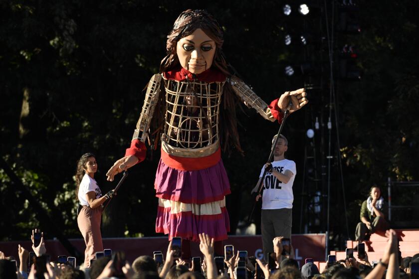 Amal, a 12-foot puppet of a 10-year-old Syrian refugee,  Sept. 24, 2022, Central Park, NY