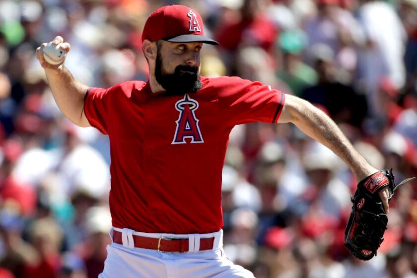 Angels starting pitcher Matt Shoemaker retired the first 13 Mariners batters in order in Monday's spring training game.