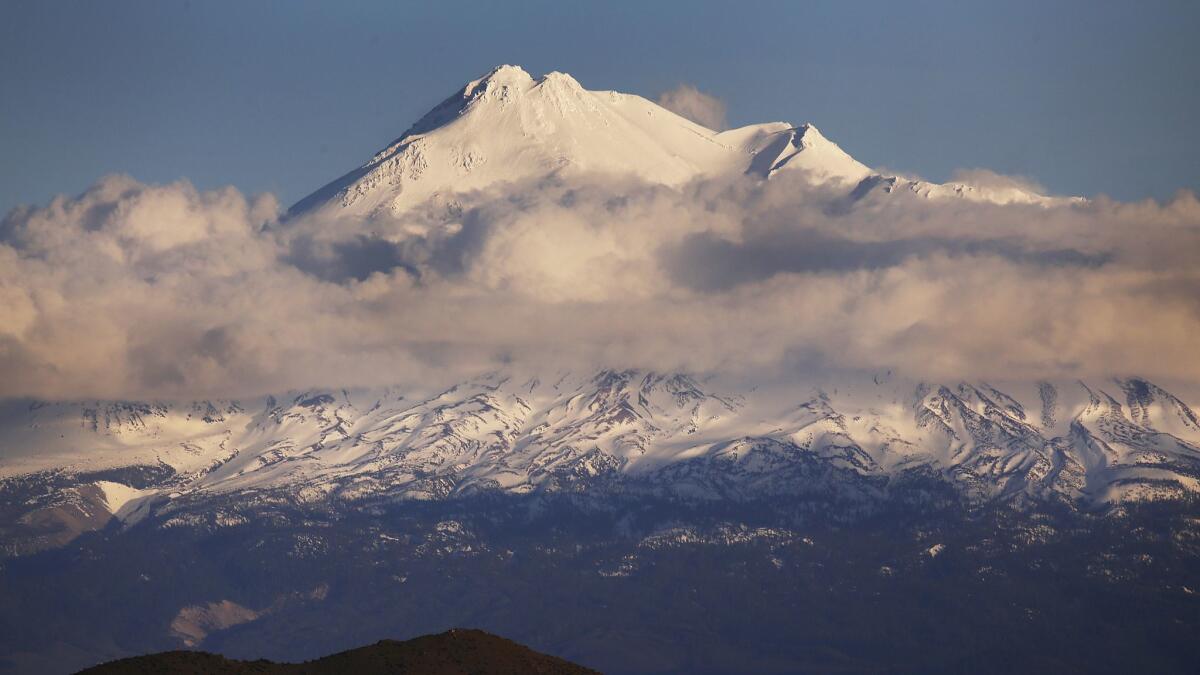The top of Mt. Shasta peeks above the clouds on April 26, 2017.