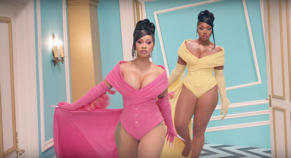 A still from Cardi B, left, and Megan Thee Stallion's "WAP" music video.