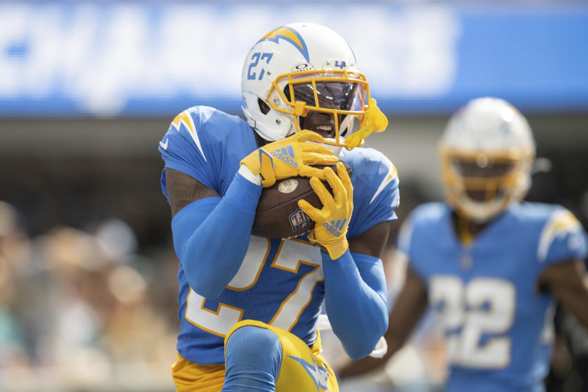 Chargers cornerback J.C. Jackson intercepts a pass against the Miami Dolphins on Sept. 10.