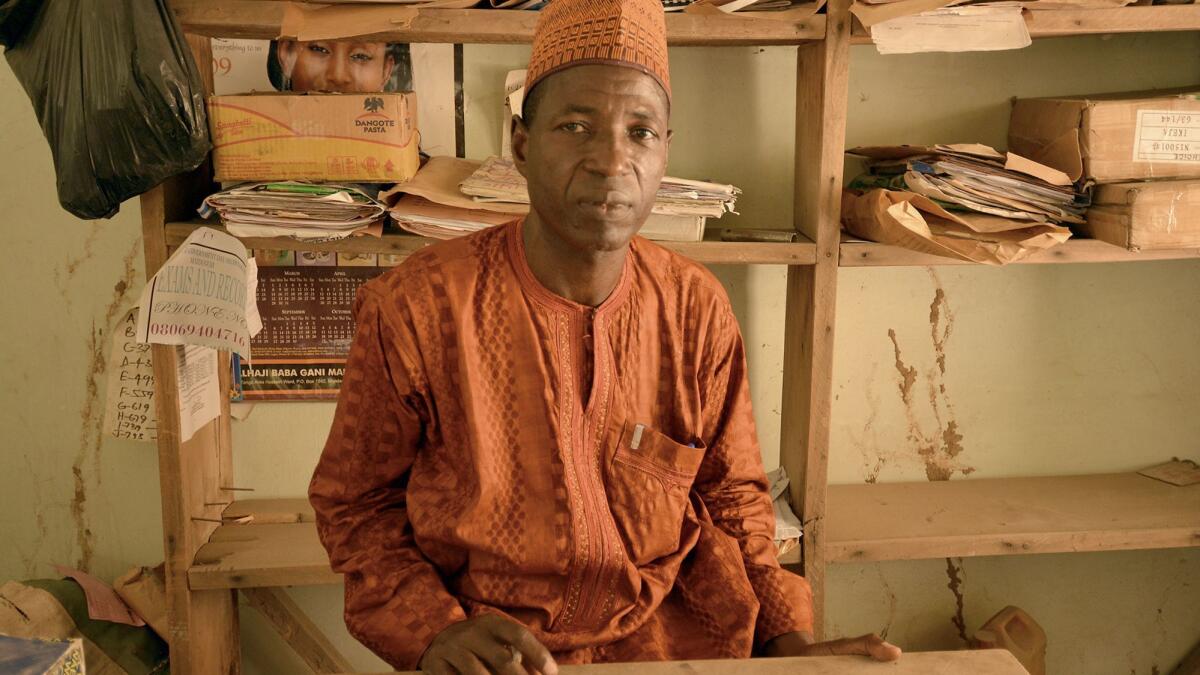 Chemistry teacher Mohammed Yahaya Nige, 50, narrowly missed being killed by Boko Haram gunmen in this office at his school in Maiduguri, Nigeria.