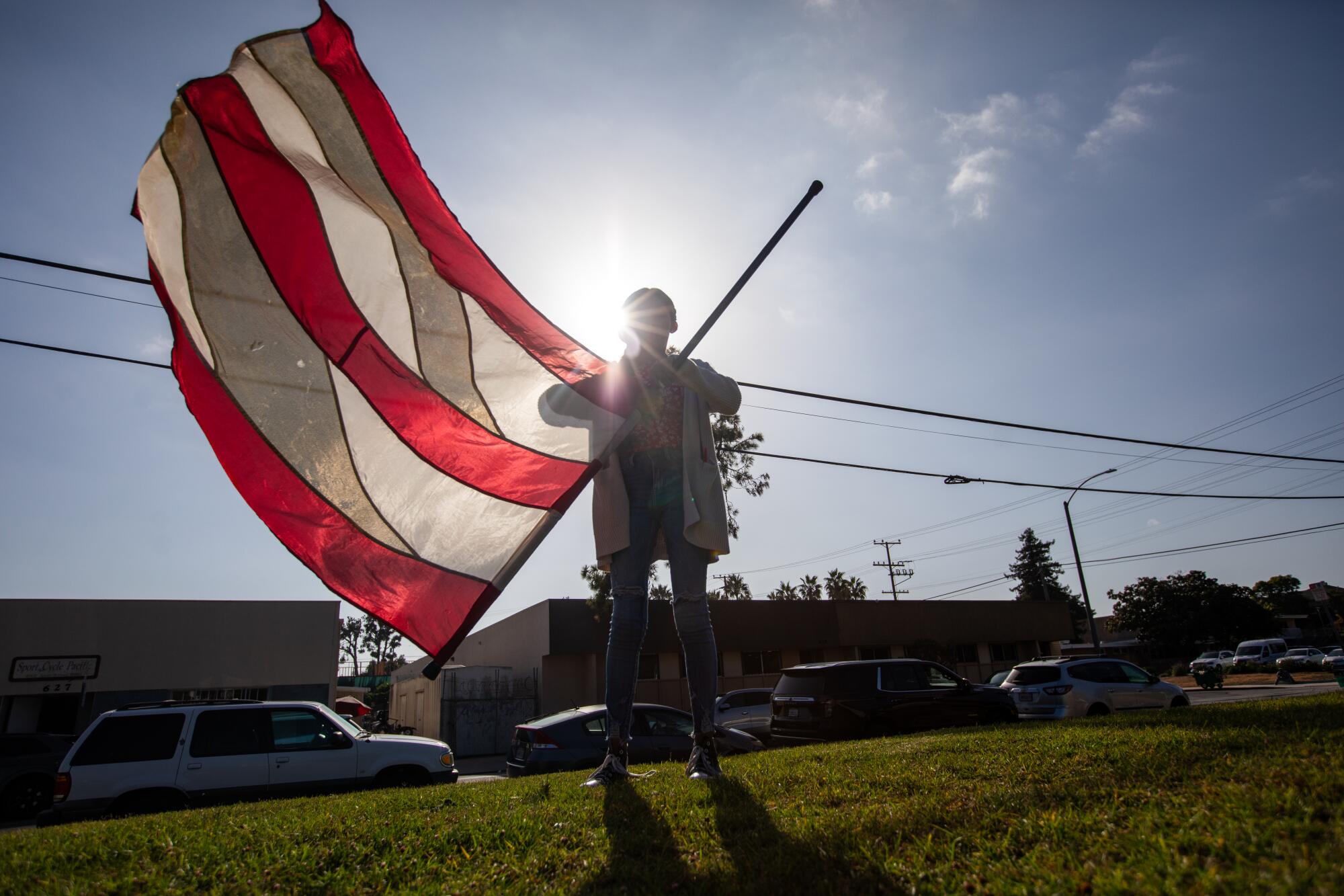 Karla Paola Rocher, 14, practices for her high school color guard at Ortega Park in Santa Barbara.