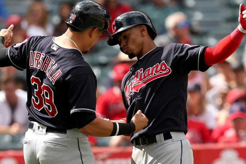 ANAHEIM, CA - SEPTEMBER 21: Francisco Lindor #12 and Giovanny Urshela #39 of the Cleveland Indians celebrate after both score on Lindor's three run home run in the fifth inning against the Los Angeles Angels of Anaheim on September 21, 2017 at Angel Stadium of Anaheim in Anaheim, California. (Photo by Stephen Dunn/Getty Images) ** OUTS - ELSENT, FPG, CM - OUTS * NM, PH, VA if sourced by CT, LA or MoD **