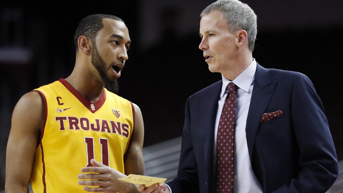 Jordan McLaughlin, talking with USC Coach Andy Enfield, says that playing in events like the NCAA tournament is something he dreamed about as a kid.