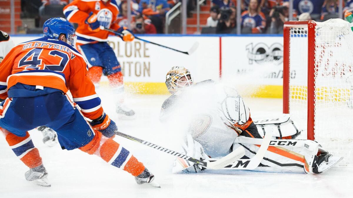 Edmonton's Anton Slepyshev scores a goal on Ducks goalie Jonathan Bernier on Sunday.