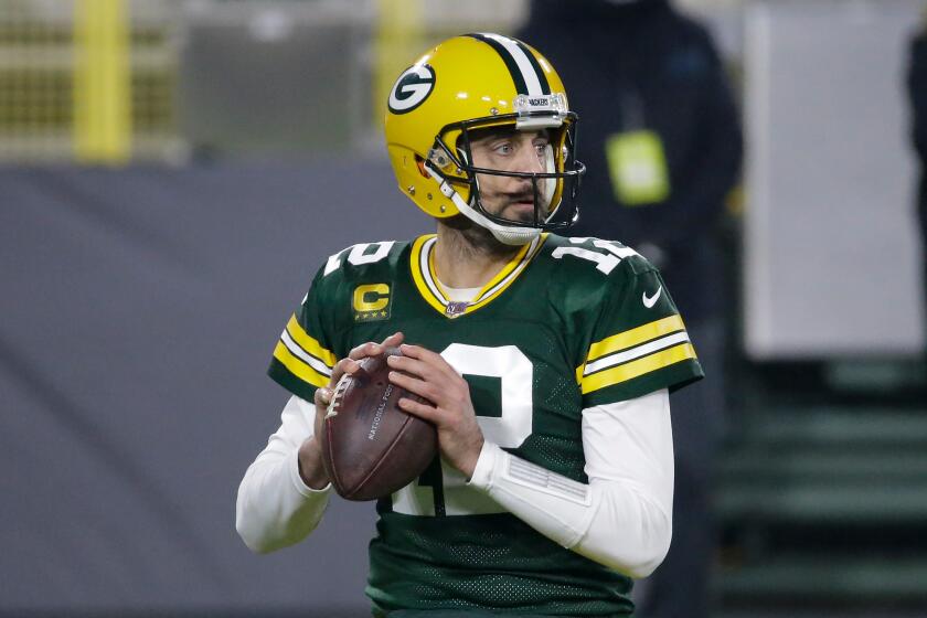 Green Bay quarterback Aaron Rodgers looks to throw against Carolina on Dec. 19, 2020.