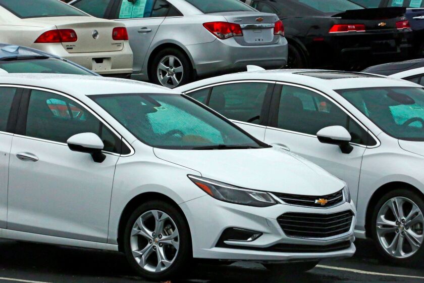 In this Thursday, Jan. 12, 2017, photo, Chevrolet cars are on sale at a dealership lot in Pittsburgh. On Thursday, June 1, 2017, the major automakers report sales for the month of May. (AP Photo/Gene J. Puskar)