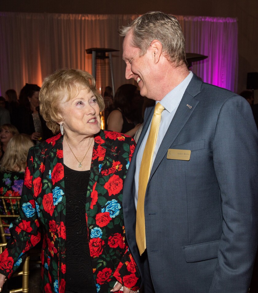 Mary Lyons and Andrew Brown visit during the season opener at Segerstrom Center for the Arts.