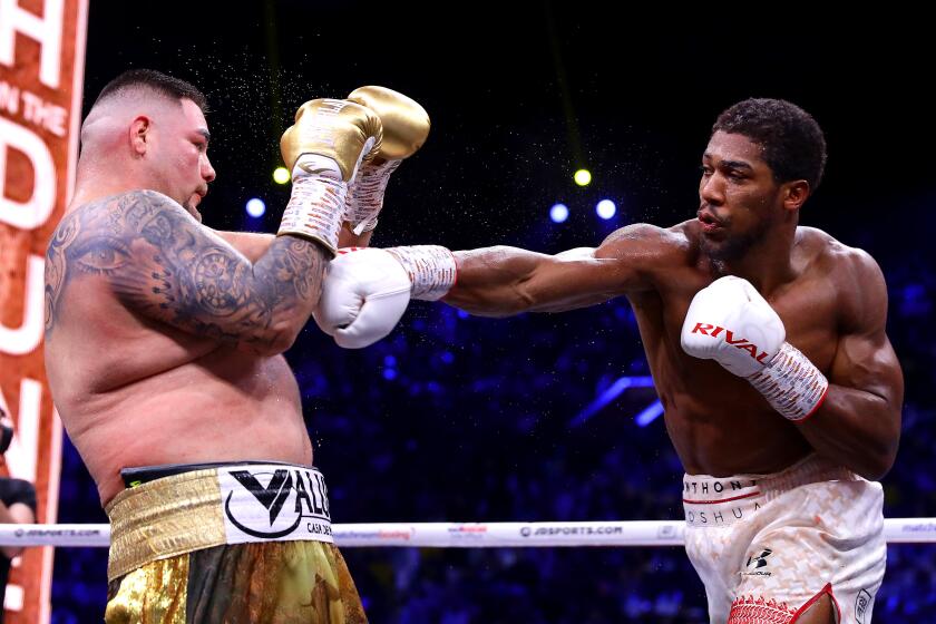 DIRIYAH, SAUDI ARABIA - DECEMBER 07: Anthony Joshua punches Andy Ruiz Jr during the IBF, WBA, WBO & IBO World Heavyweight Title Fight between Andy Ruiz Jr and Anthony Joshua during the Matchroom Boxing 'Clash on the Dunes' show at the Diriyah Season on December 07, 2019 in Diriyah, Saudi Arabia (Photo by Richard Heathcote/Getty Images) ** OUTS - ELSENT, FPG, CM - OUTS * NM, PH, VA if sourced by CT, LA or MoD **