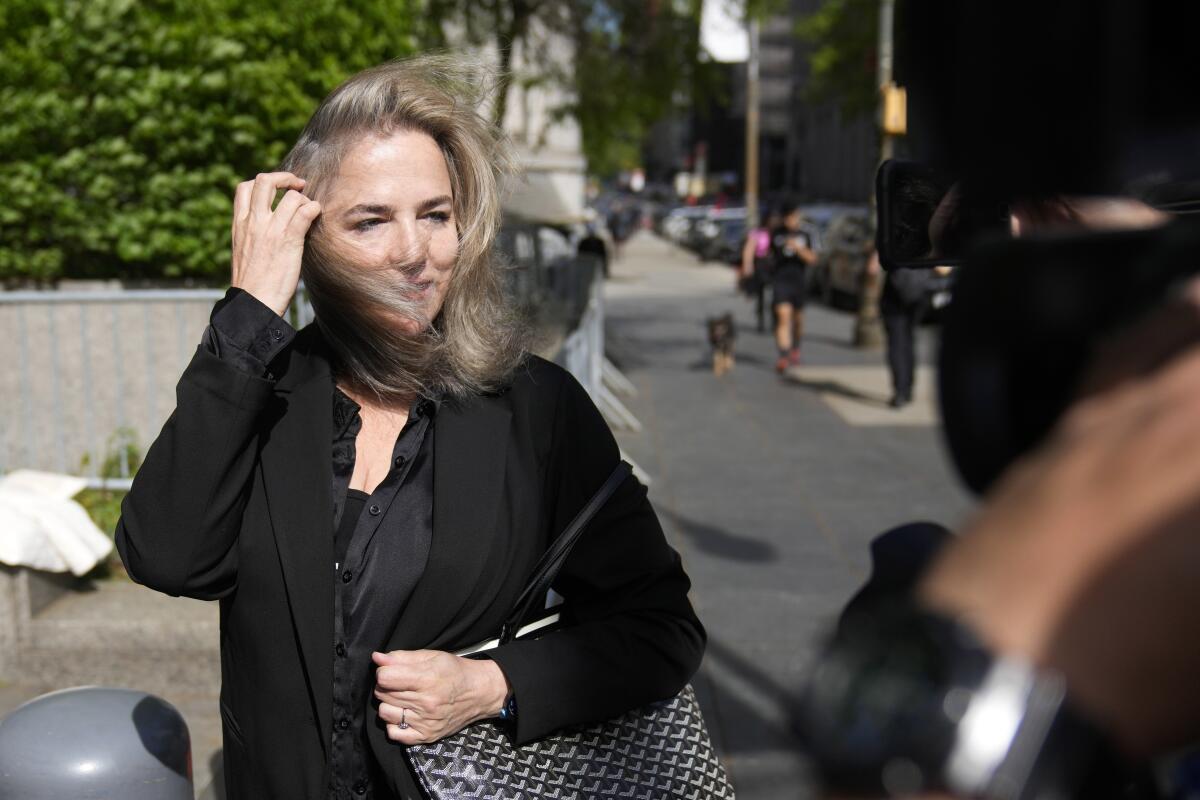 A woman arrives at federal court in New York.