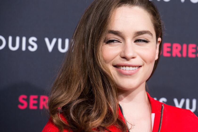 Emilia Clarke says she isn't having second thoughts about turning down a lead role in "Fifty Shades of Grey."