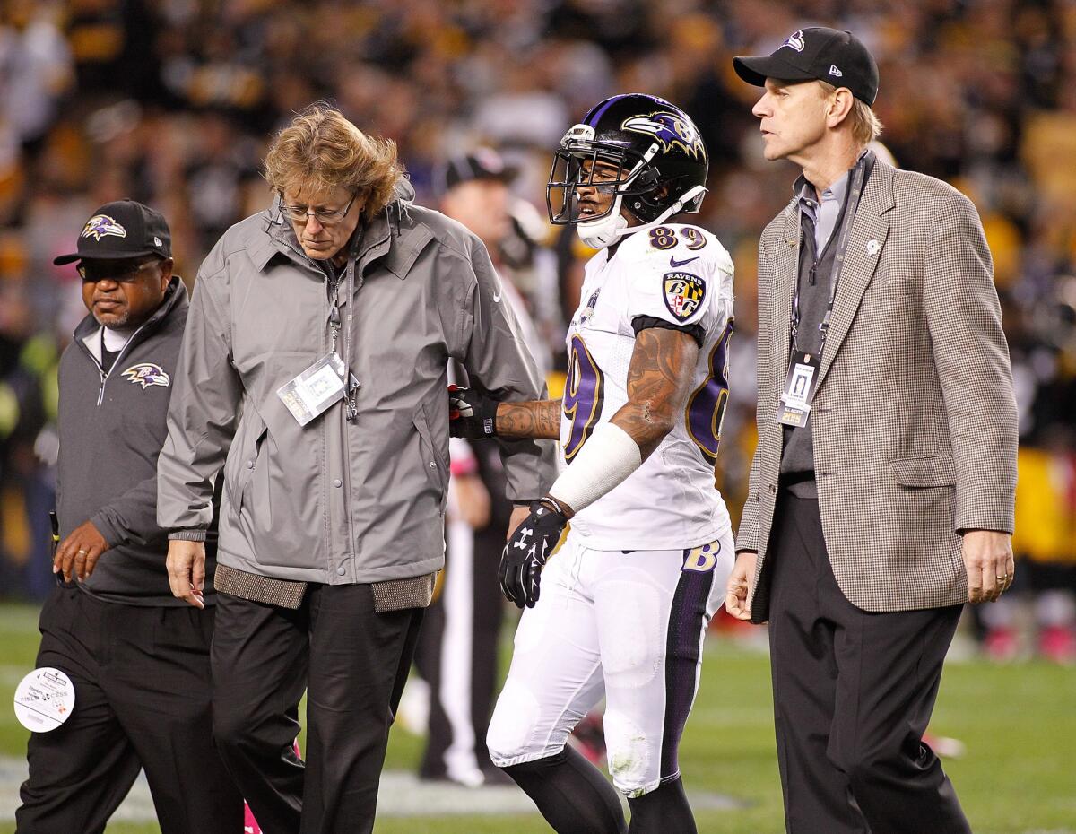 Baltimore receiver Steve Smith walks off of the field during the third quarter against Pittsburgh on Thursday night.